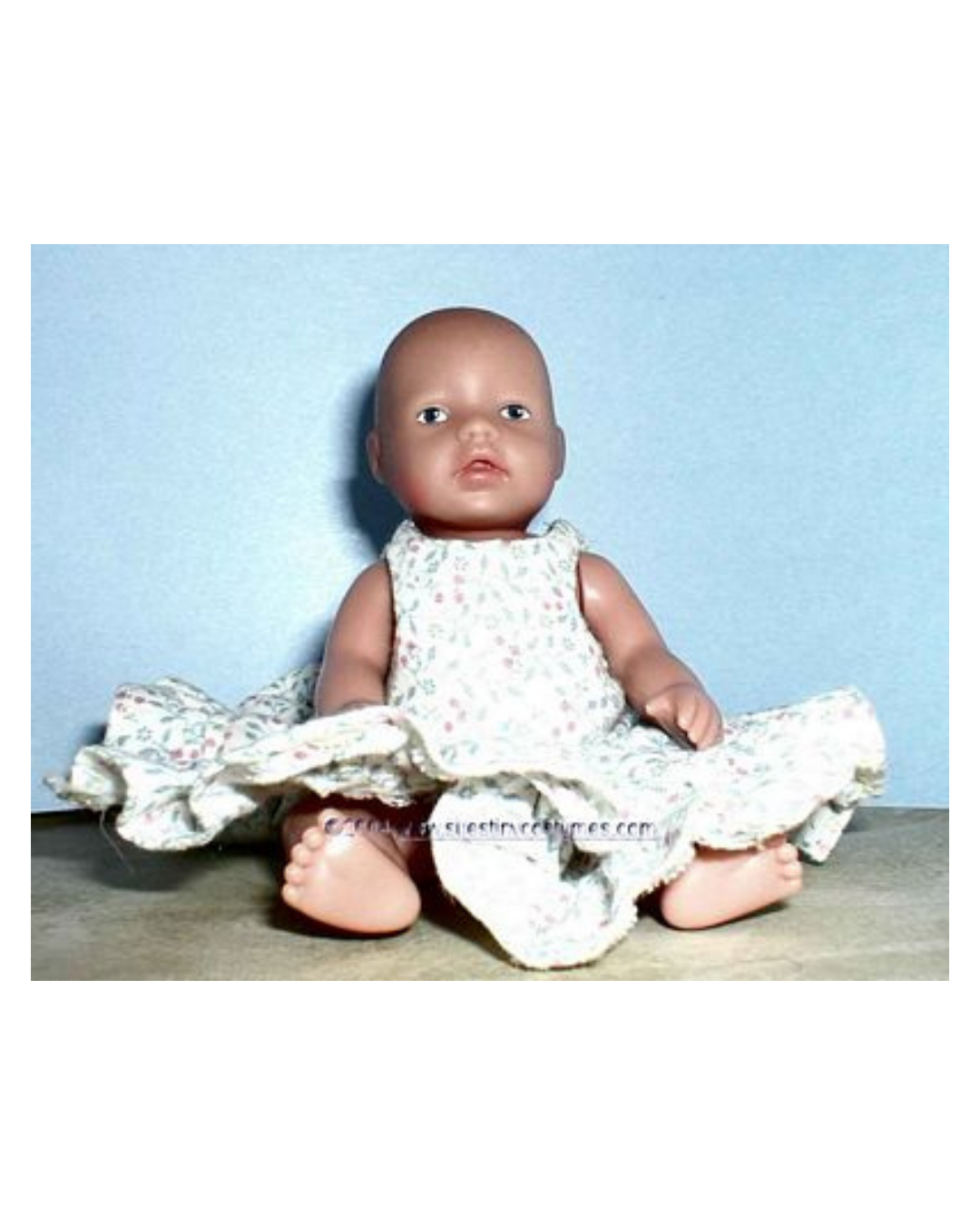 Sew a mini baby born ruffled dress pattern